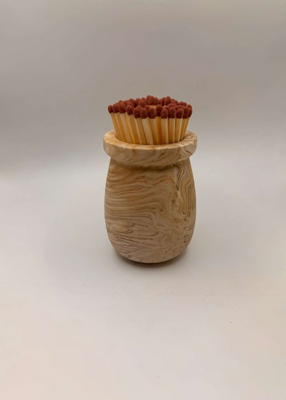 Handcrafted Match Pot, Matches and Striker in Wood Effect | UKWood effect, this handmade match pot comes complete with: 

Match Pot
Coloured safety matches
Striker card 

Colour: Beige and natural combination resembling wood
MaCandle MatchesMalmo HomeMalmo HomeHandcrafted Match Pot