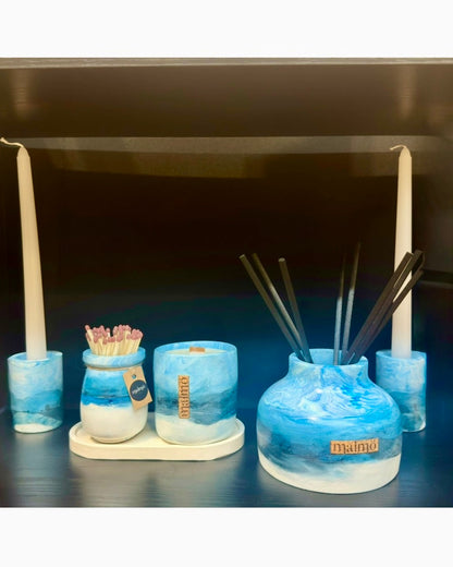 Refillable handmade Dröm reed diffuser with sky blue marbled pot and 8 reeds for long-lasting fragrance