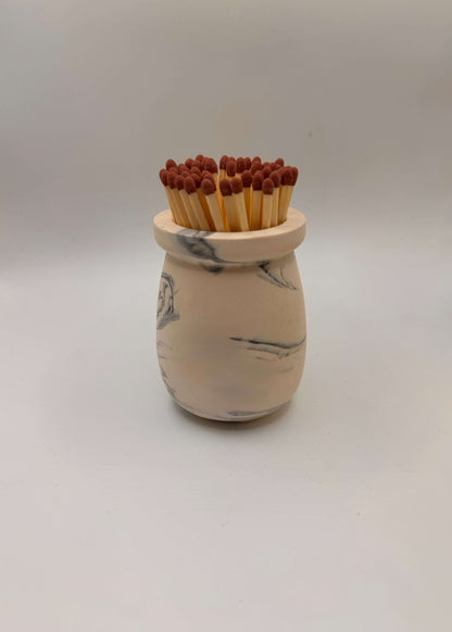 Handcrafted Match Pot, Matches and Striker in Natural with Hints of BlNatural and black, this handmade match pot comes complete with: 

Match Pot
Coloured safety matches
Striker card 

Colour: Natural with hints of black
Match colour wCandle MatchesMalmo HomeMalmo HomeHandcrafted Match Pot