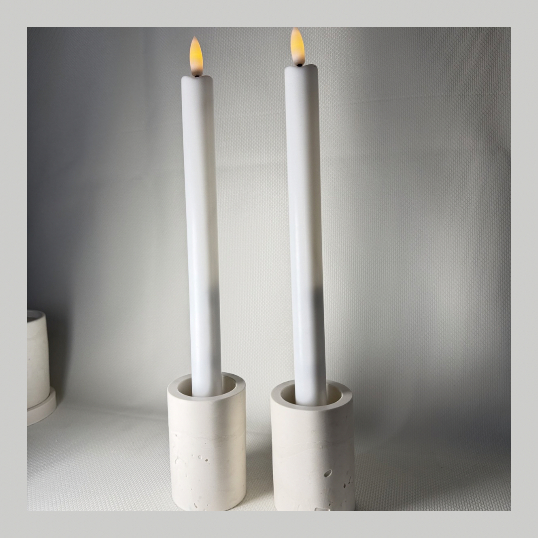 Set of two minimalist handmade candlestick holders in natural tone for calm interiors and flame-free lighting