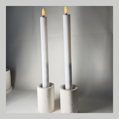 Set of two minimalist handmade candlestick holders in natural tone for calm interiors and flame-free lighting