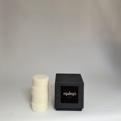 Malmo Home Malmo Moments, close detail of ceramic candle pot and reed diffuser
