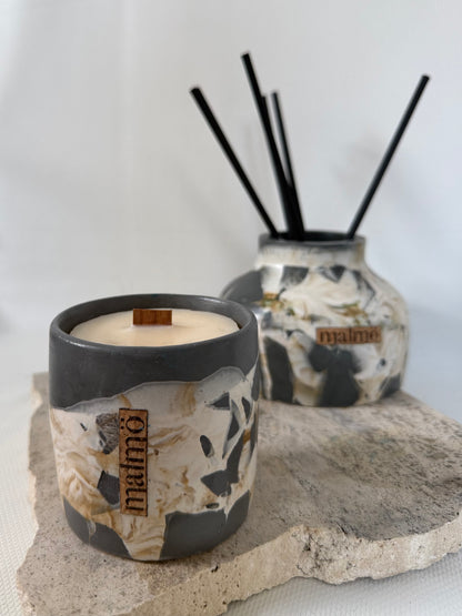 Malmo Home beige candle pot, soft stone-effect glaze, styled on neutral surface
