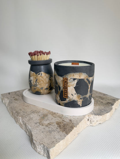 Malmo Home charcoal, beige and natural candle pot trio, grouped flat lay
