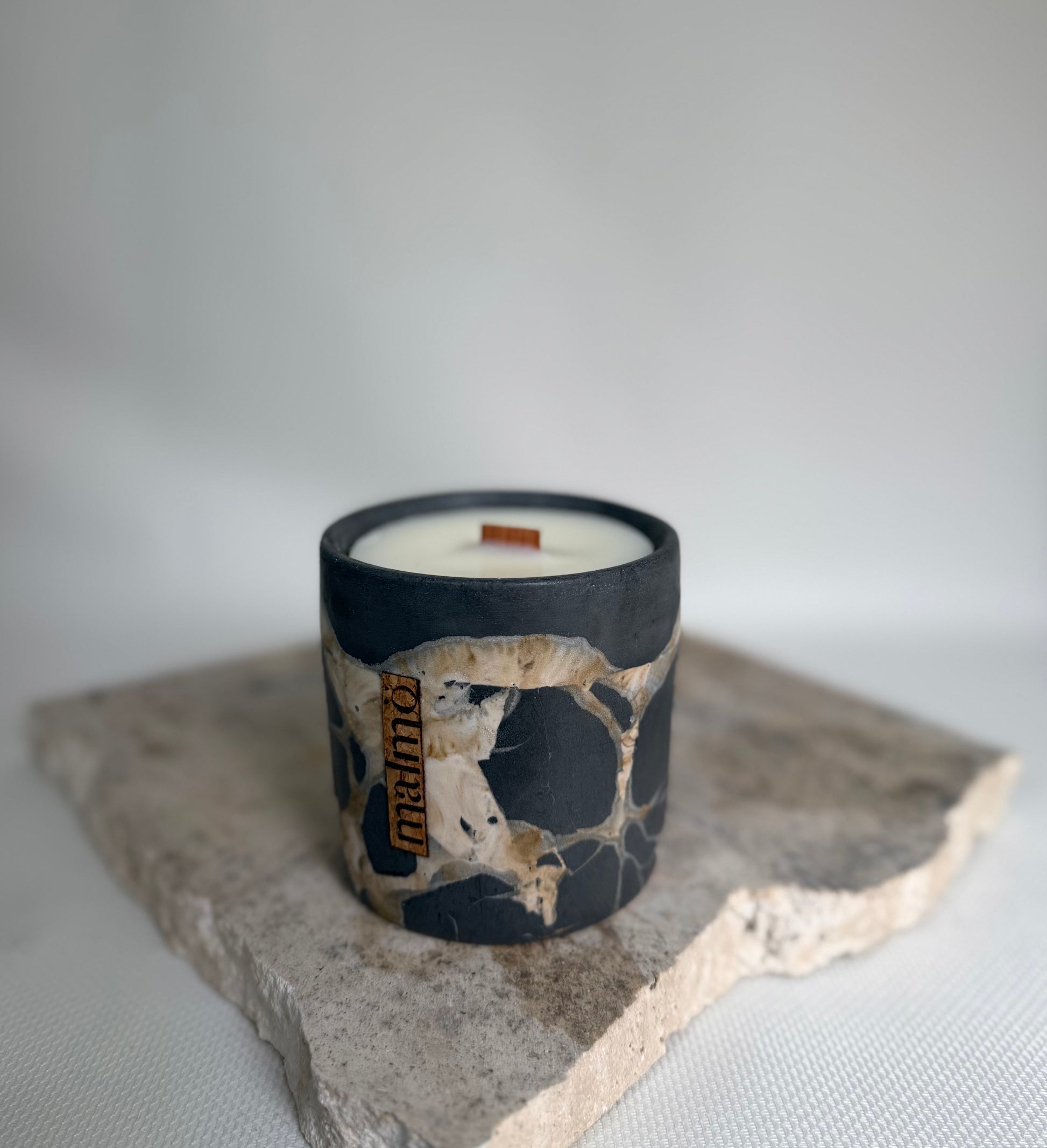 Malmo Home charcoal candle pot, deep matte stone-effect ceramic, front view
