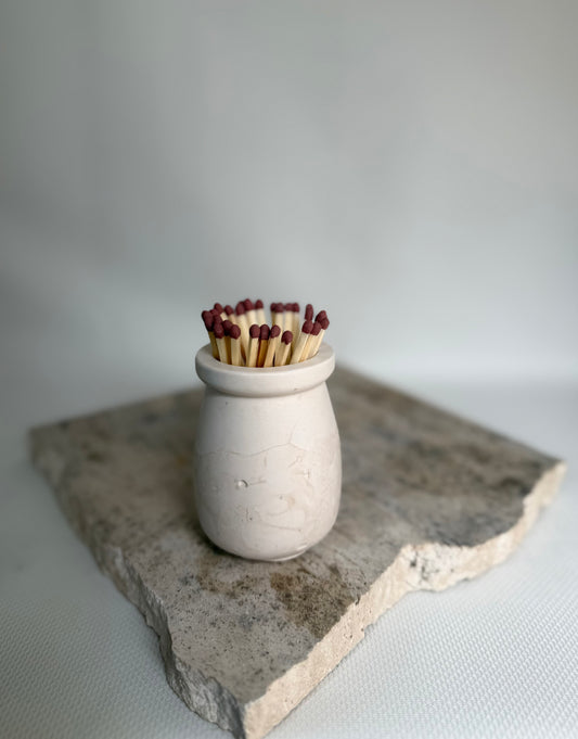 Malmo Home Natural match pot, clean stone-effect ceramic finish with long safety matches, front view
