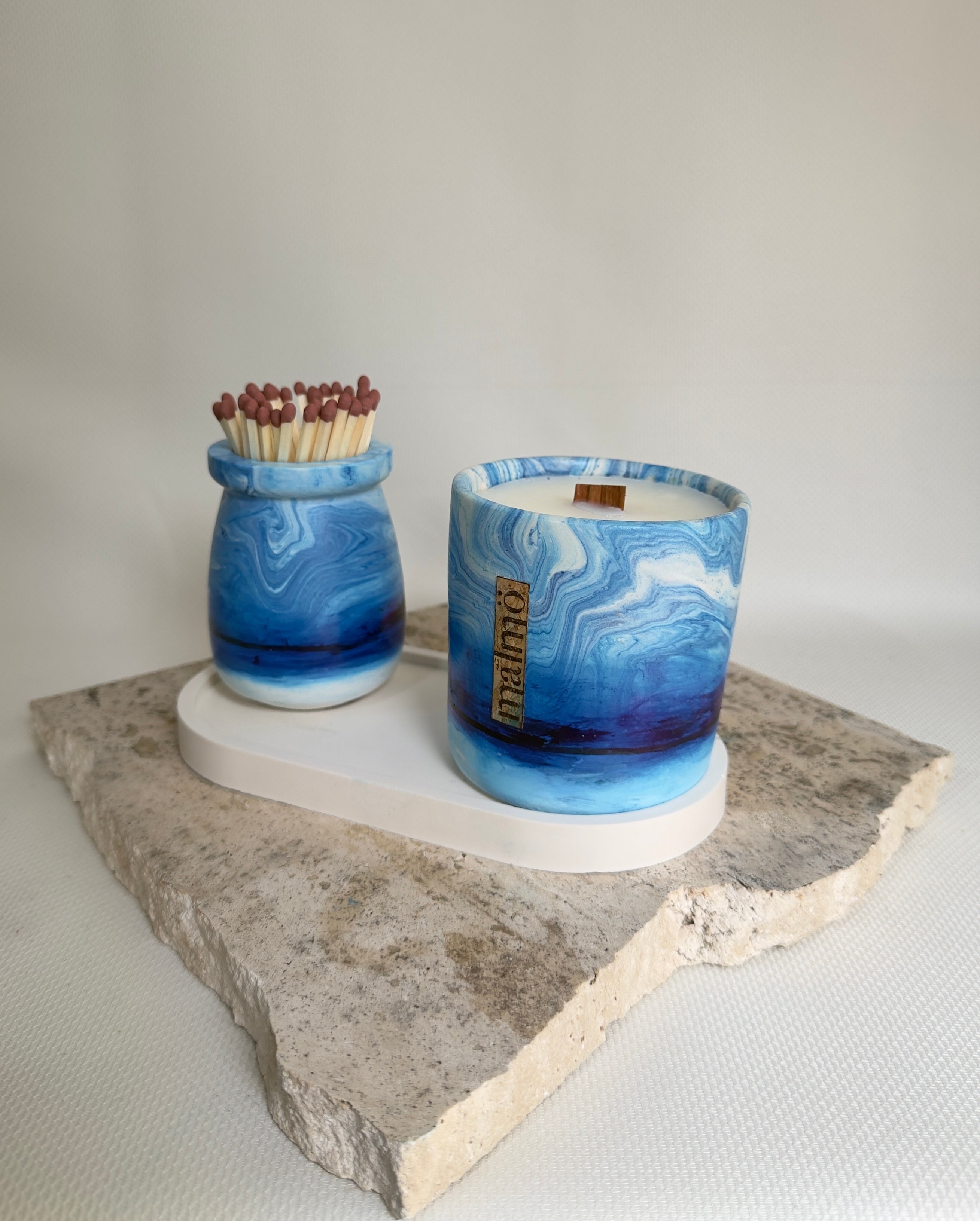 Malmo Home Sky Candle Pot Set, pale blue stone-effect ceramic pots styled on neutral surface
