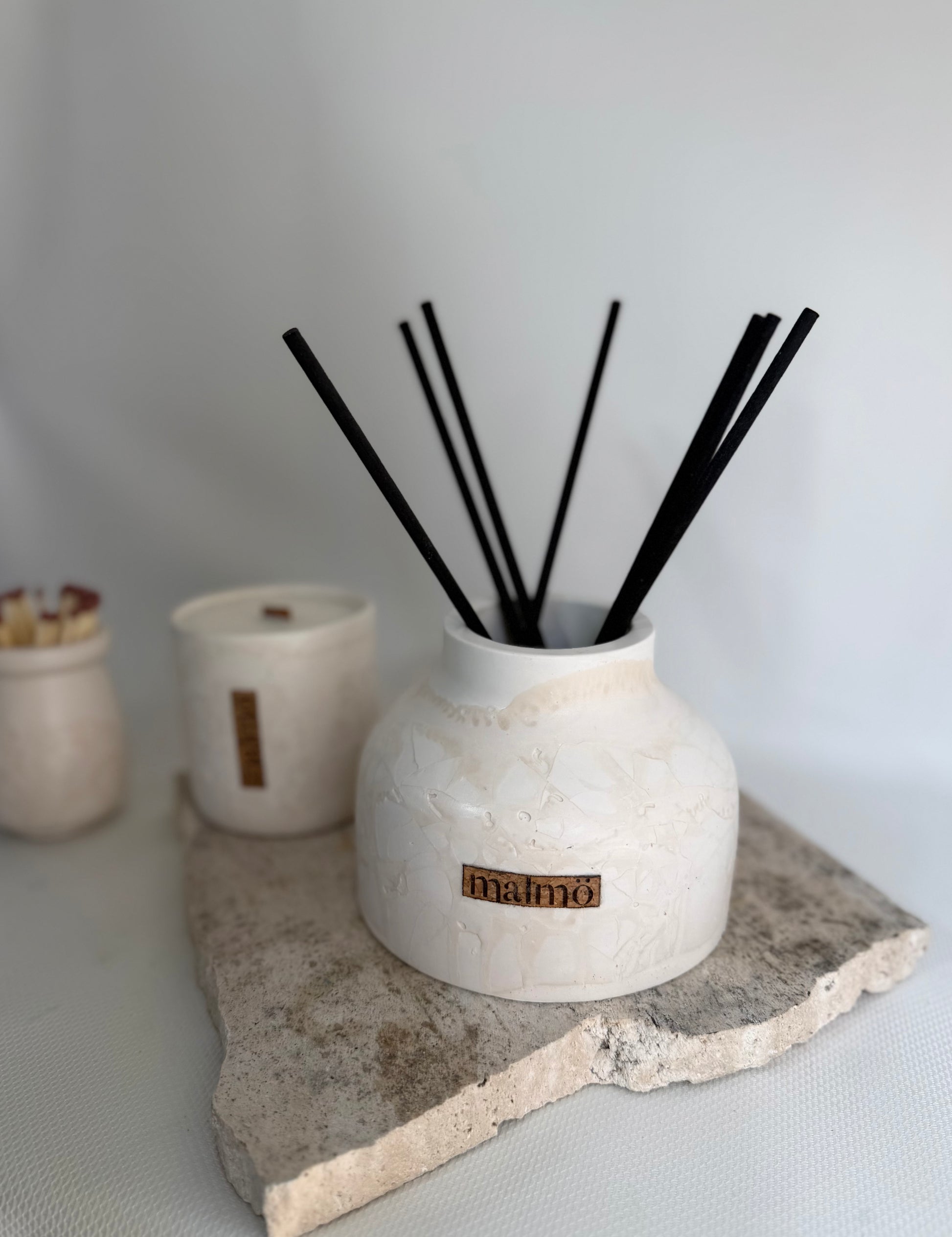 Malmo Home Natural Drom diffuser, styled with dried botanicals, soft ambient light
