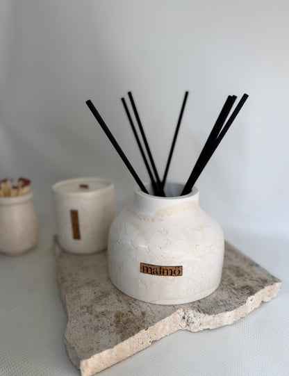 Malmo Home Natural Drom diffuser, styled with dried botanicals, soft ambient light
